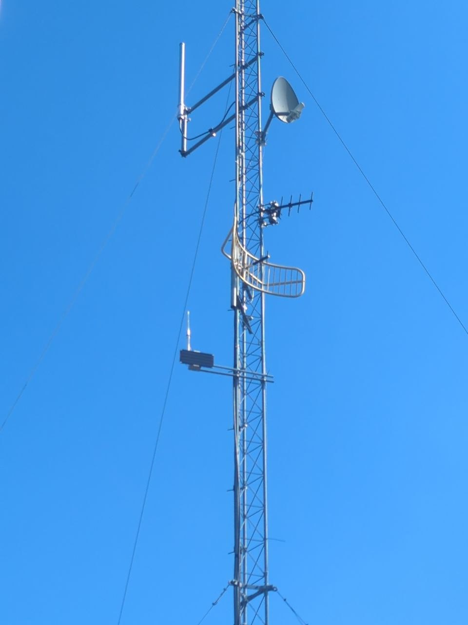 MeshCore node installed on a tower for maximum coverage